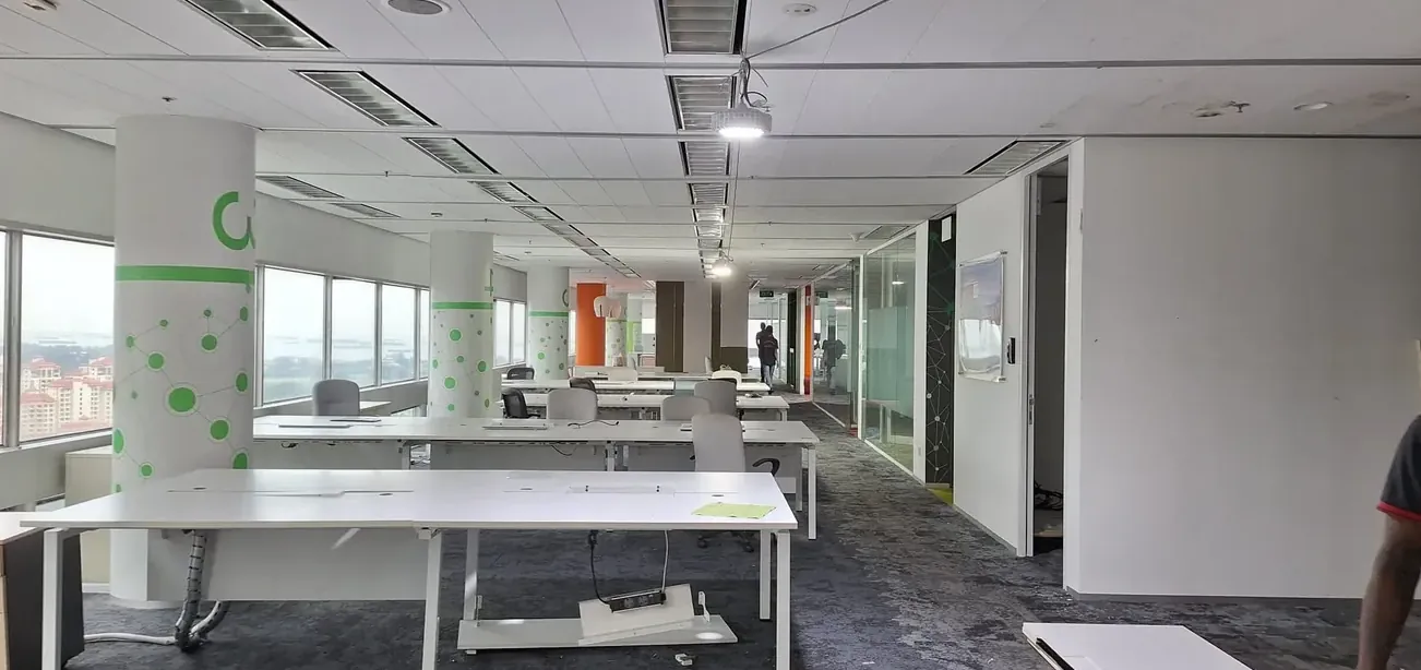 Office floor in Singapore before reinstatement, with workstations, partitions and fittings still in place